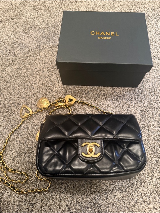CHANEL Handbags - CHANEL GWP Black Quilted Leather Crossbody with Gold Heart Chain bag